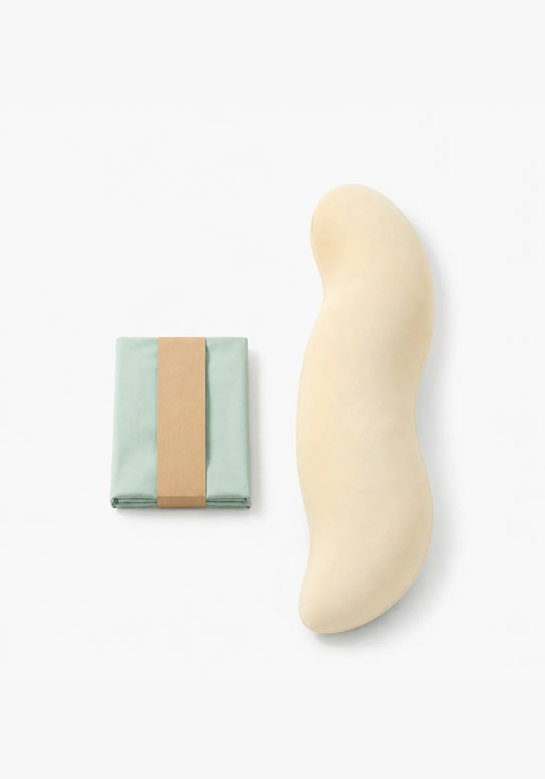 Beside body pillow with a folded removable pillow cover
