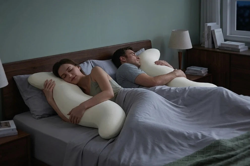 Couple in bed with Beside pillow