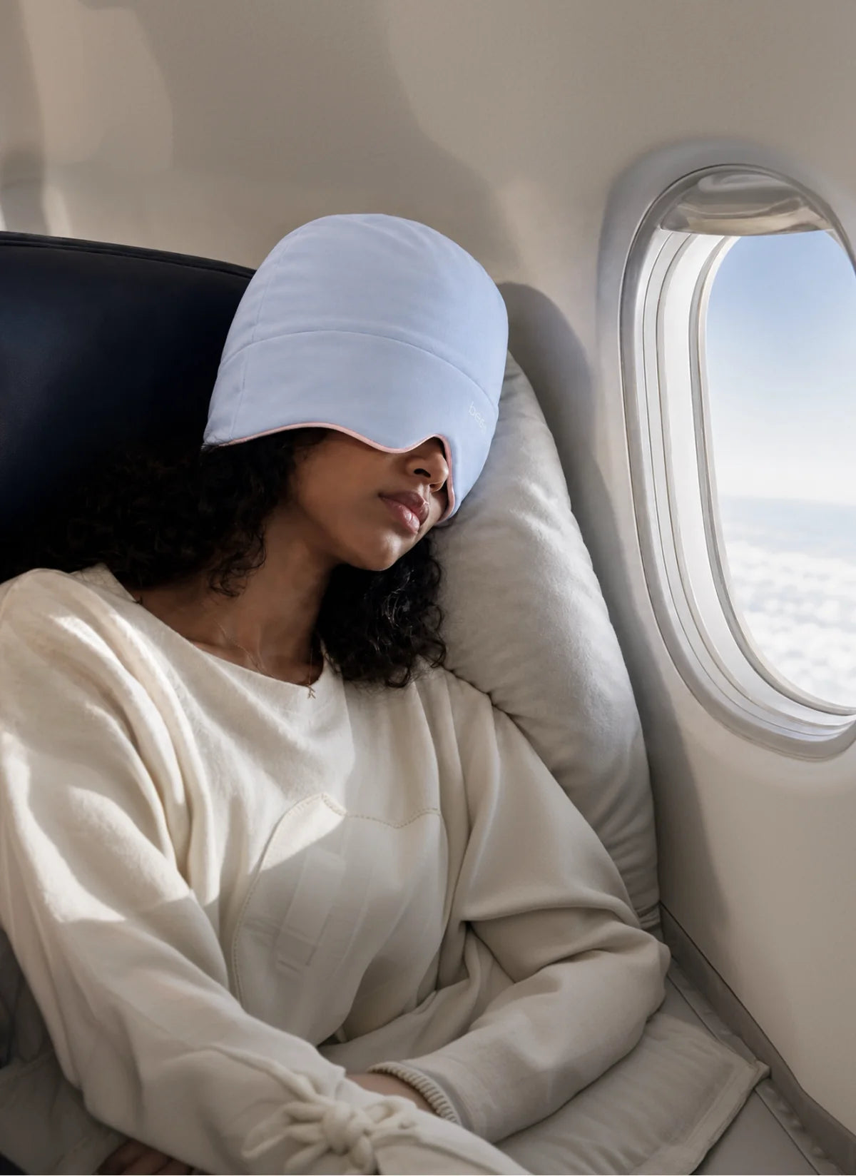 Traveler resting in a Sleep Hood